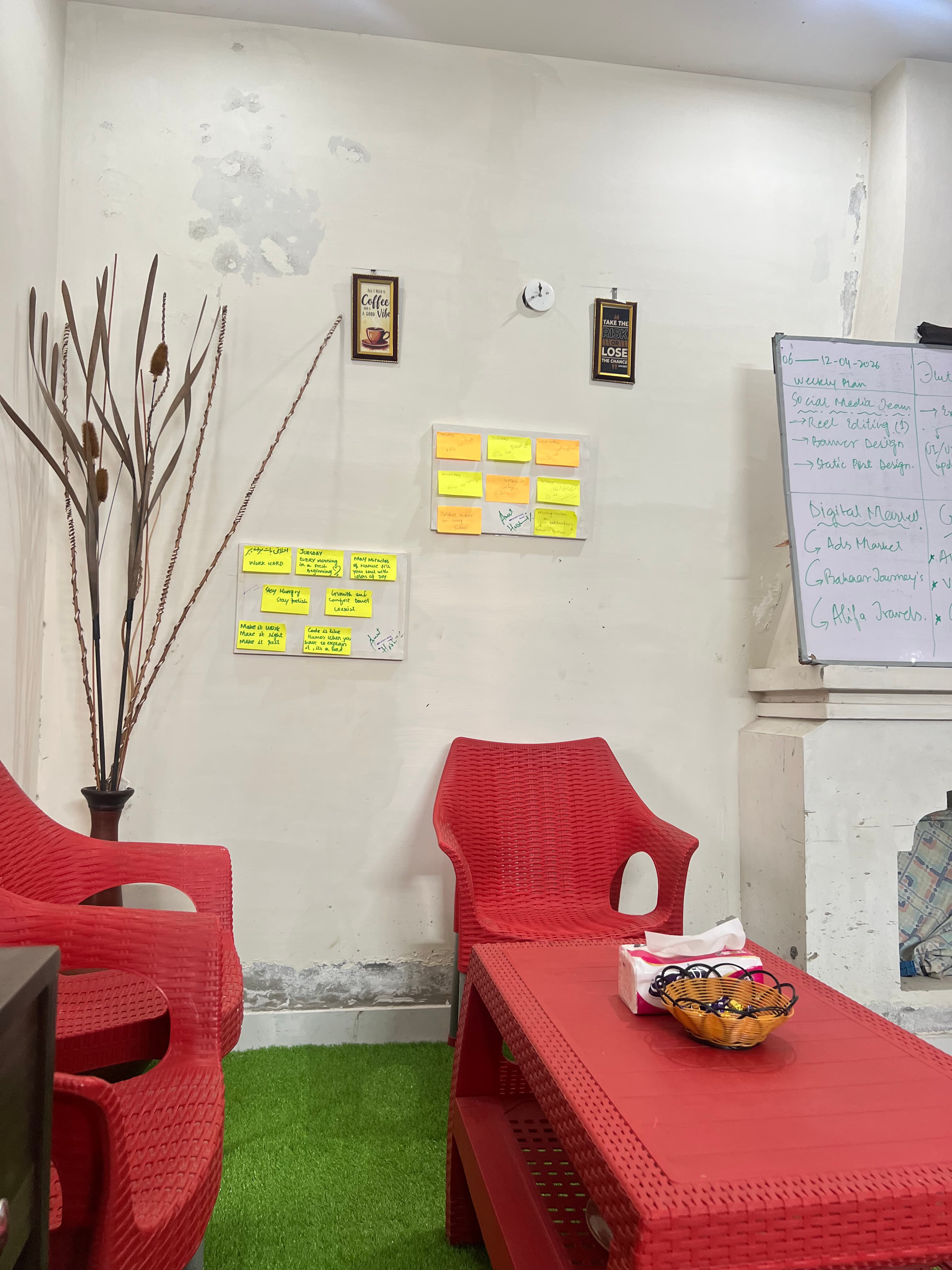 Colleagues engaging in discussion or teamwork at Infinity Wave